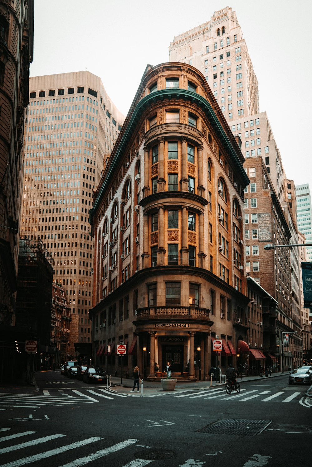 a tall building with a street in front of it