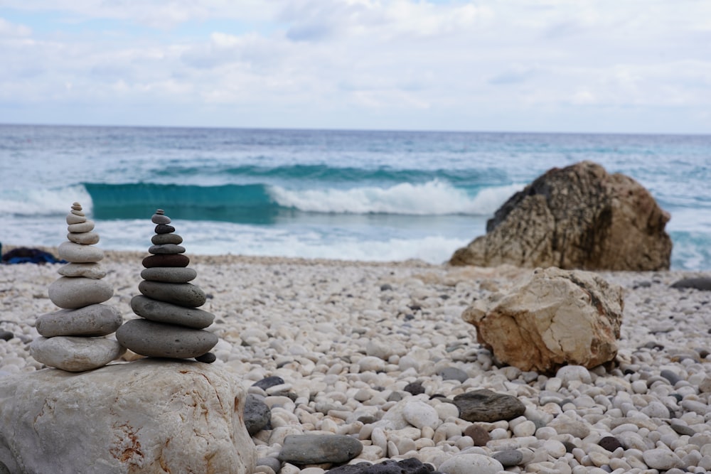 a group of rocks on a beach