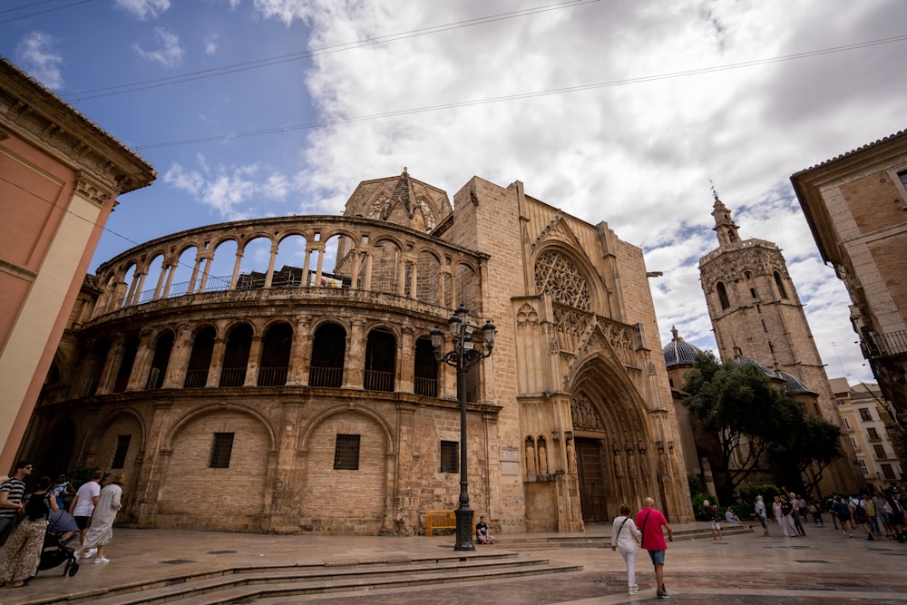 a large stone building with many arches