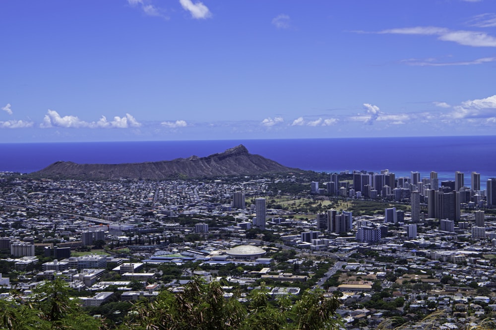 a city with a mountain in the background