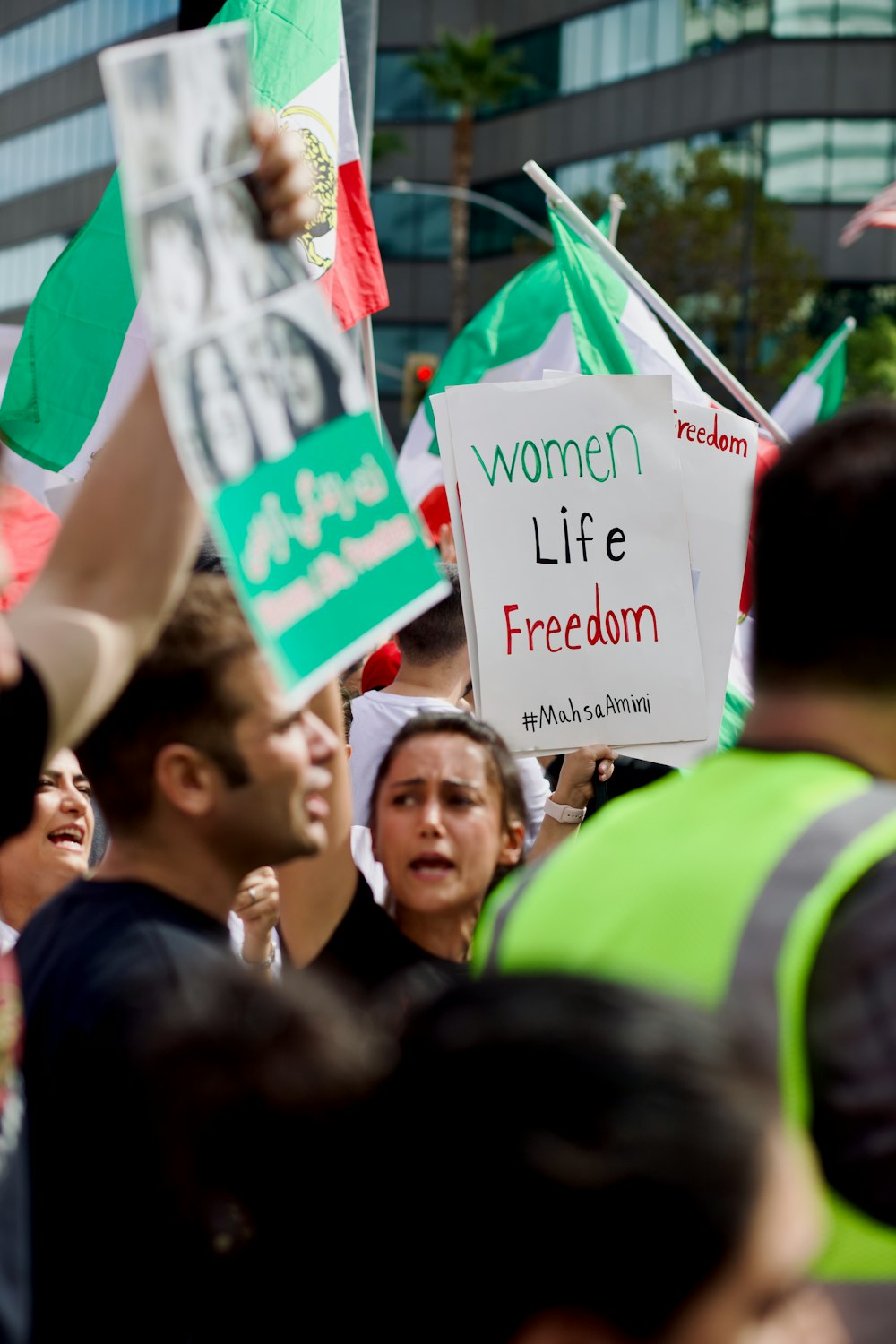 a group of people holding signs