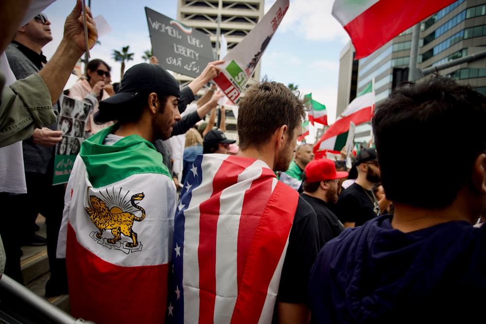 a group of people holding signs