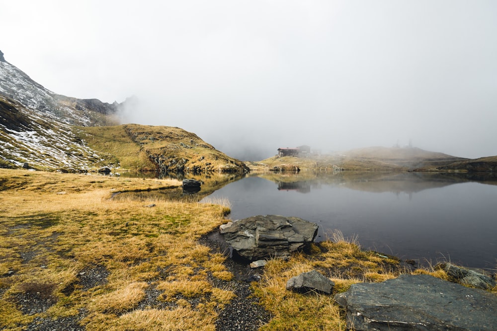 a lake surrounded by hills