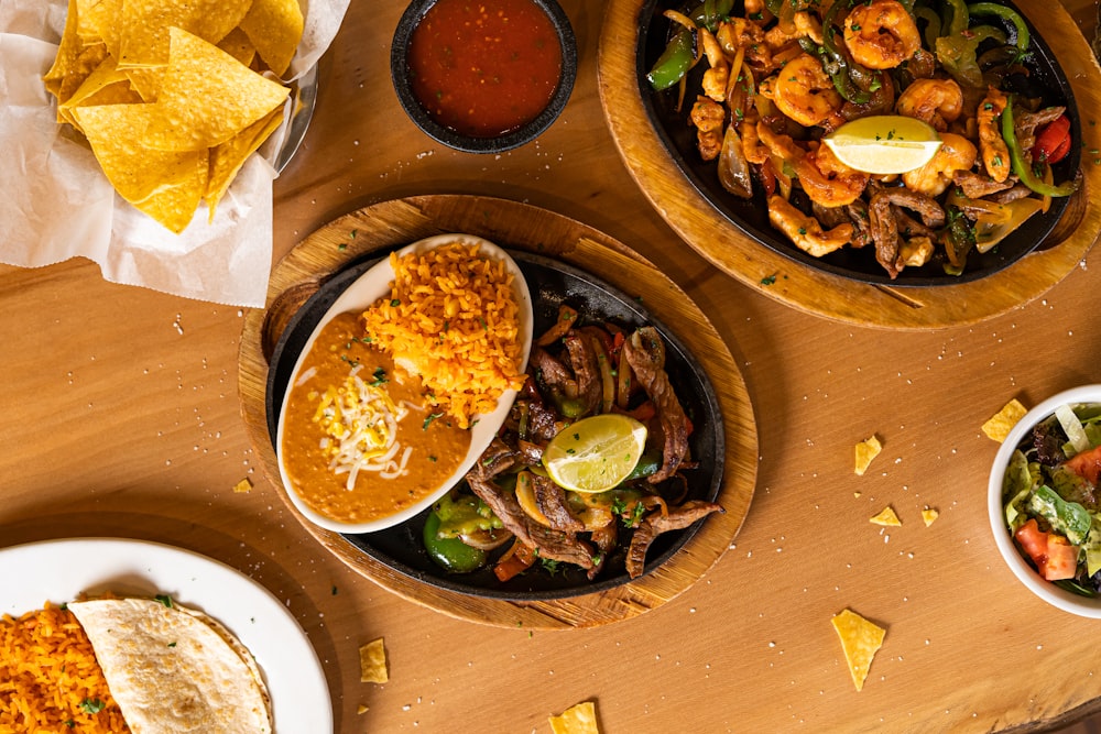 a group of plates with food on them