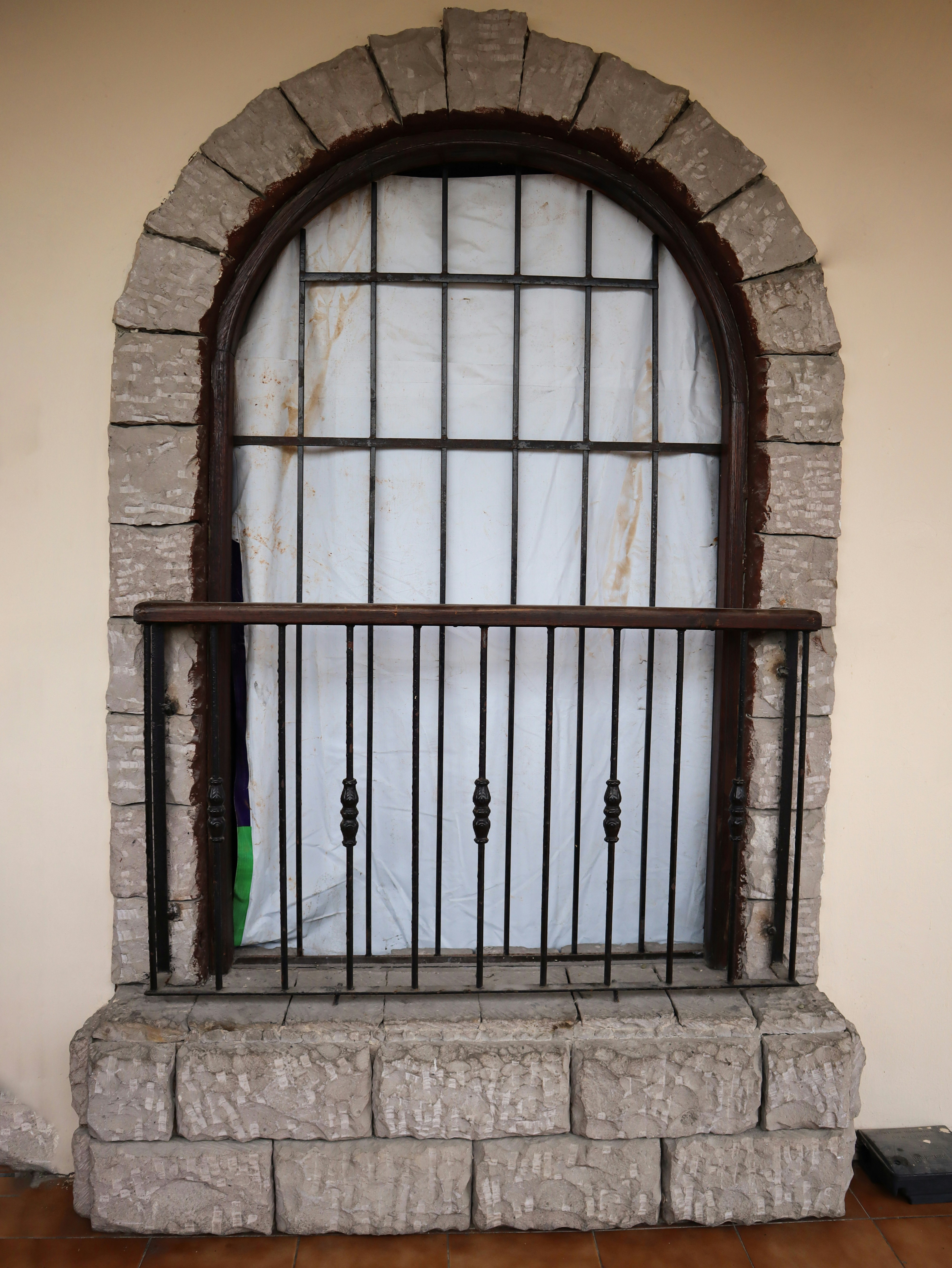 a window in a stone building