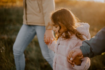 a person holding a child