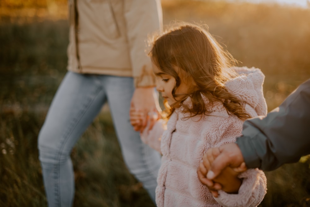 a person holding a child