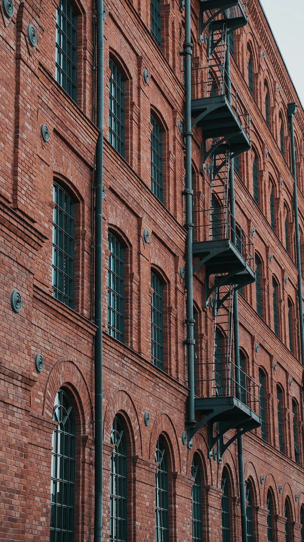 a brick building with balconies