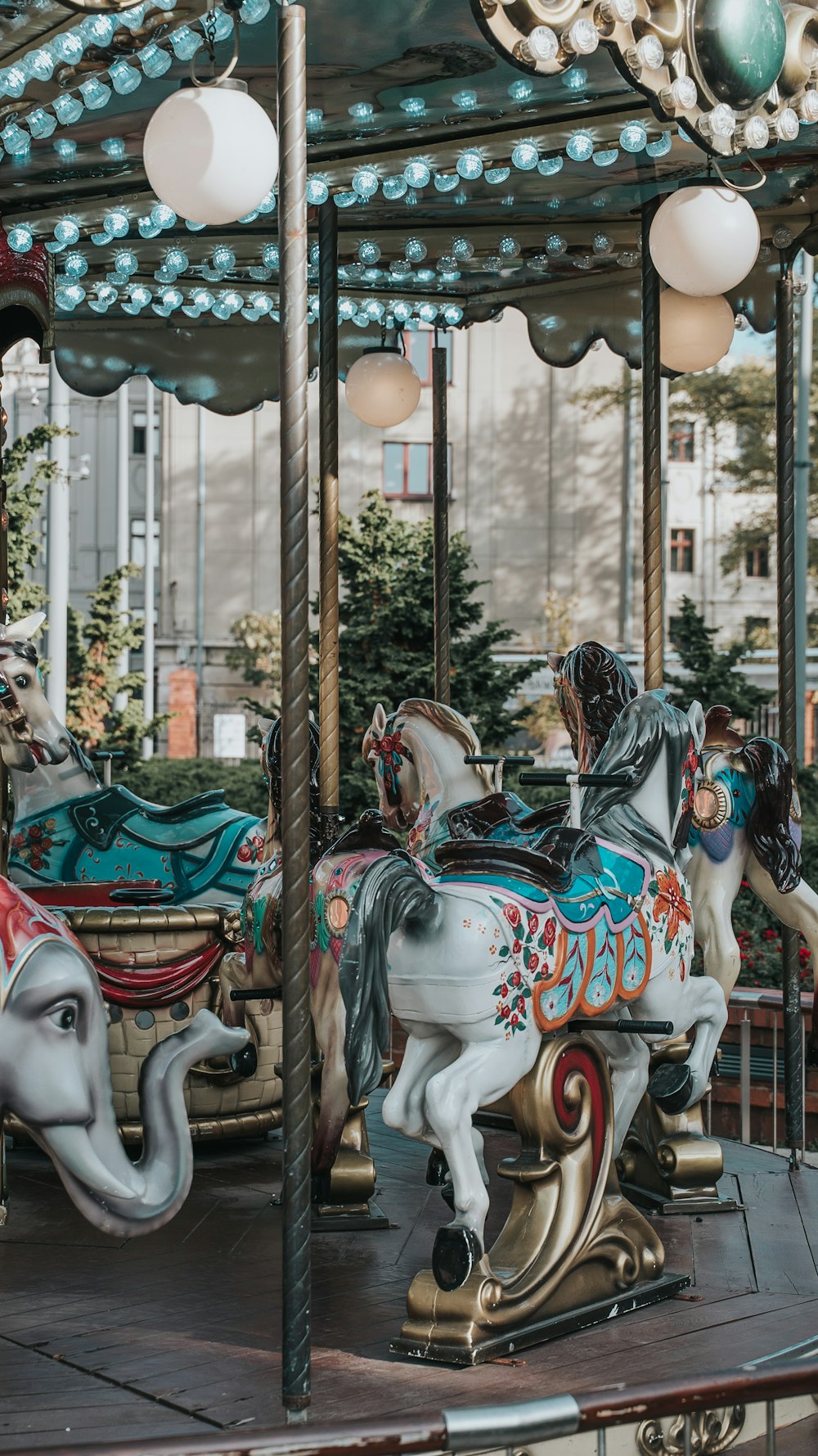 a carousel with a couple of horses