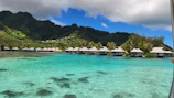 Lavish overwater bungalow with turquoise waters in Bora Bora.
