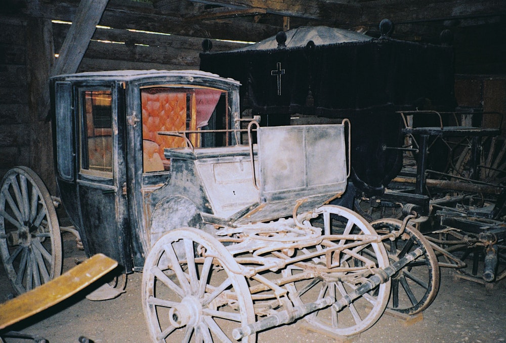 a carriage in a barn