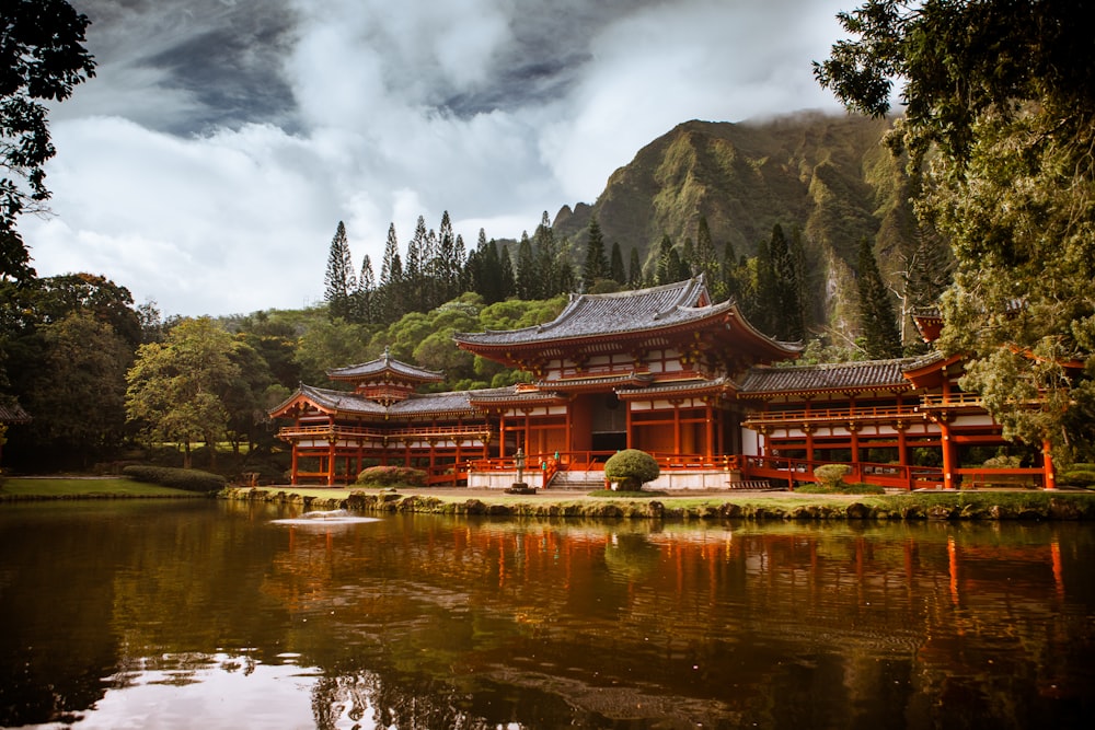 a building with a mountain in the background