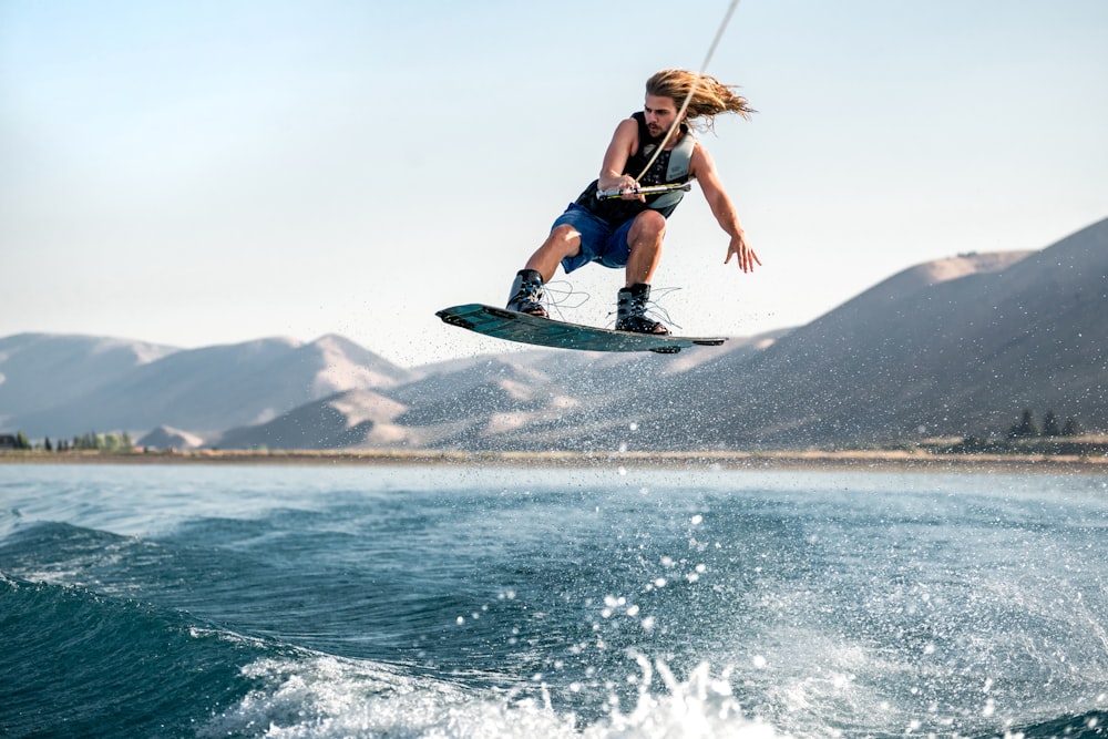 a man riding a wakeboard