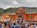 A serene snapshot of the village temple adorned with marigold garlands during a festive celebration.