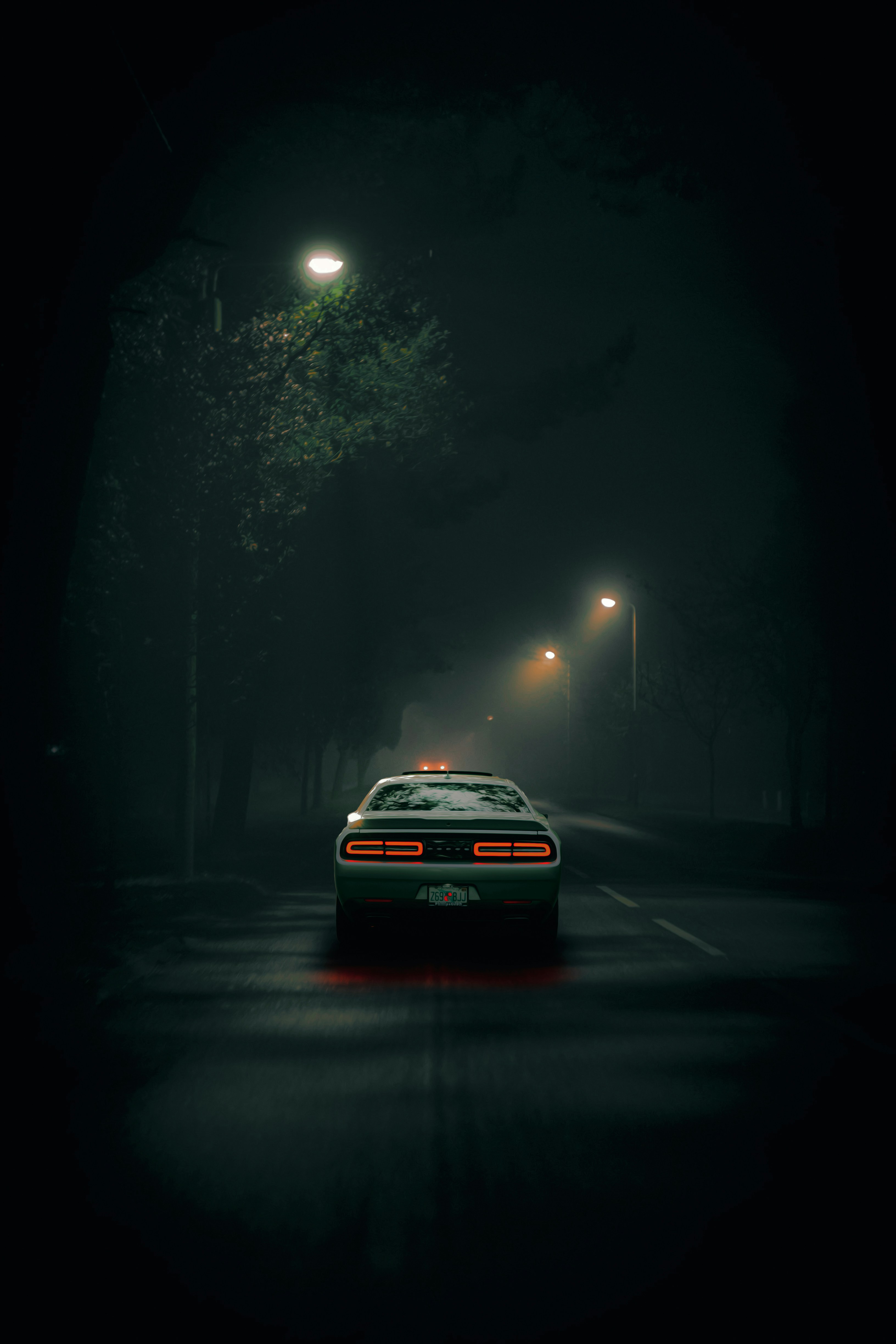 a car on a road at night