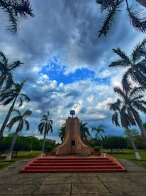 Close-up of the iconic orange-colored monument in Petrolina with clear blue sky.