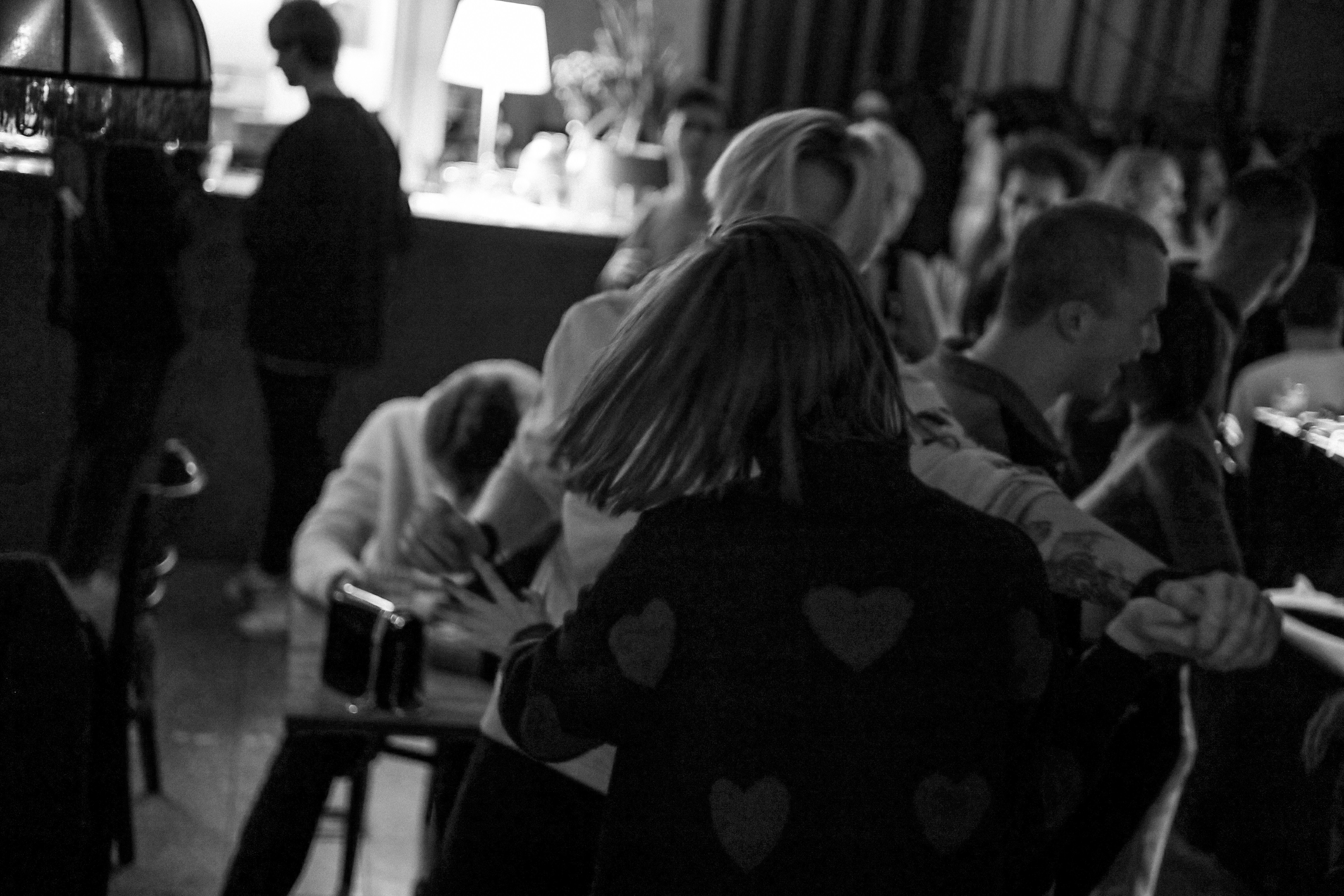 a group of people sitting at a table