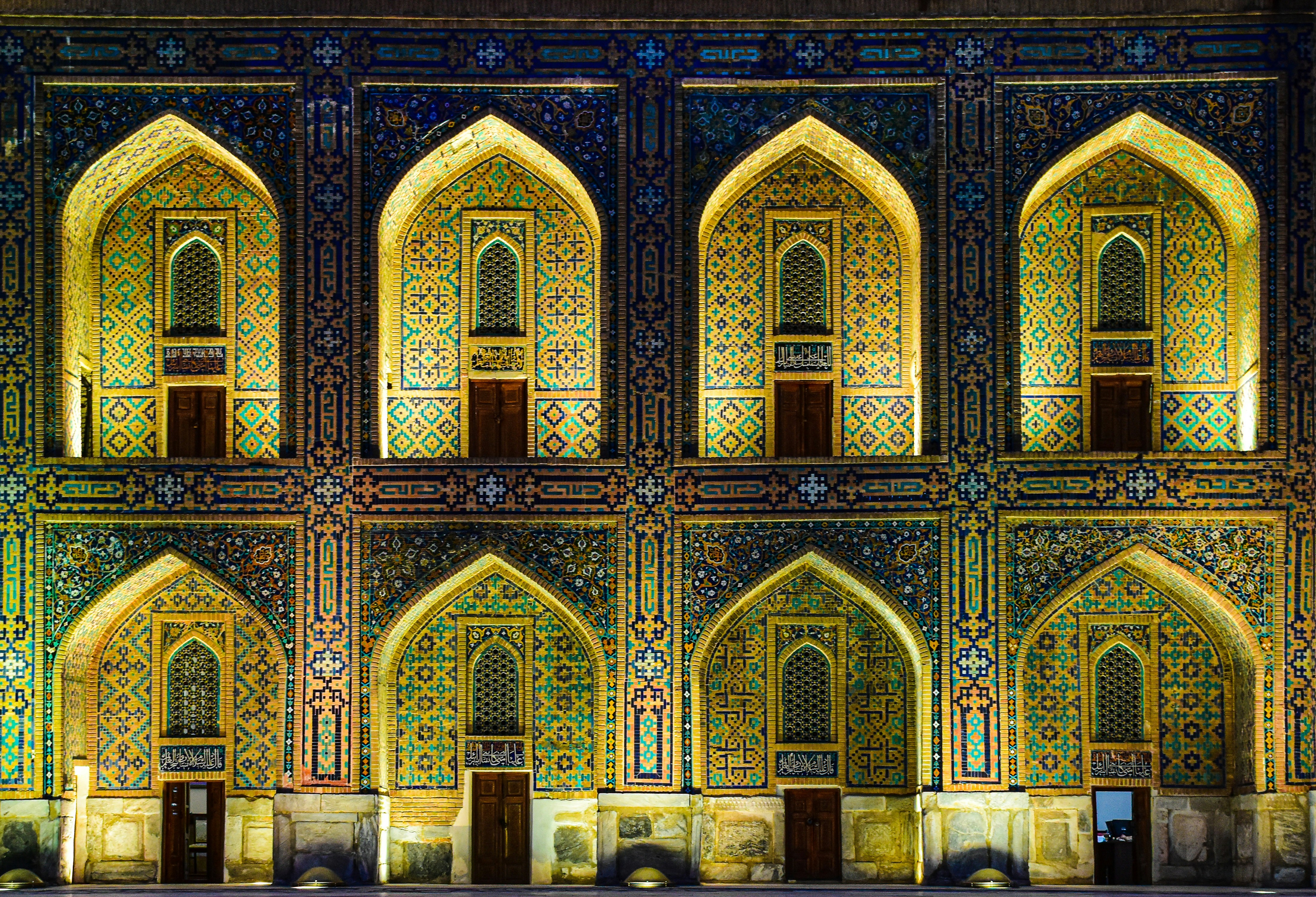 a building with many windows, Registan in Samarkand, Uzbekistan.