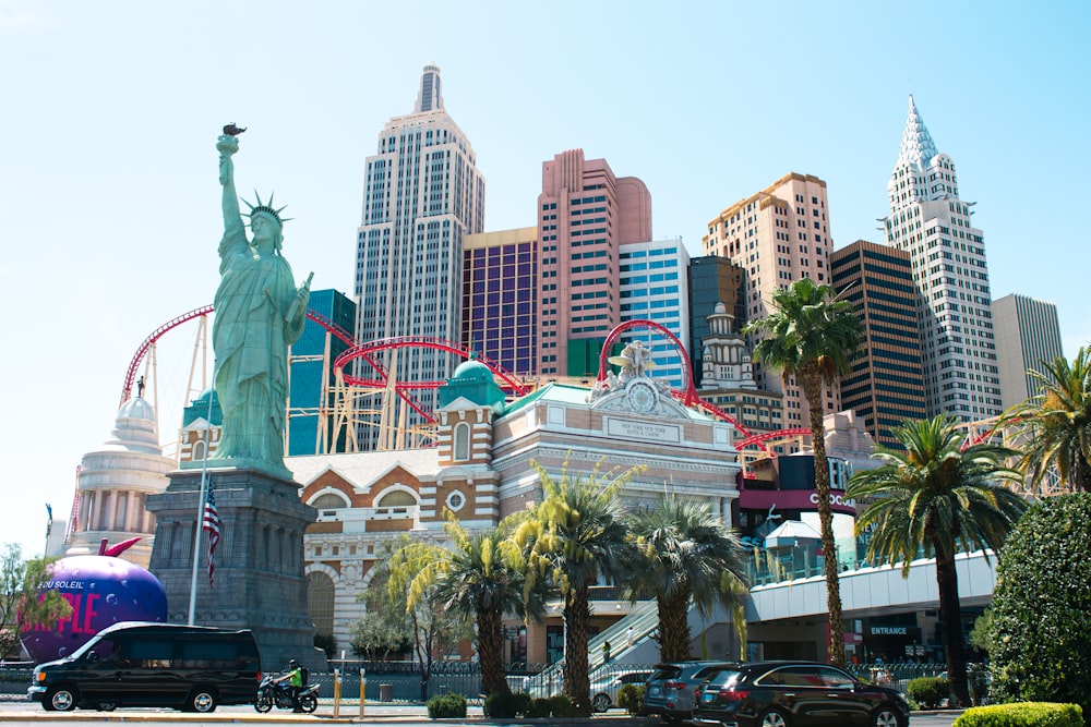 a statue in front of New York-New York Hotel and Casino