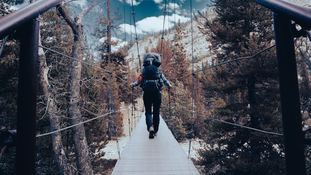 a person walking on a bridge