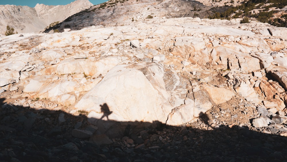 a rocky area with a hole in it