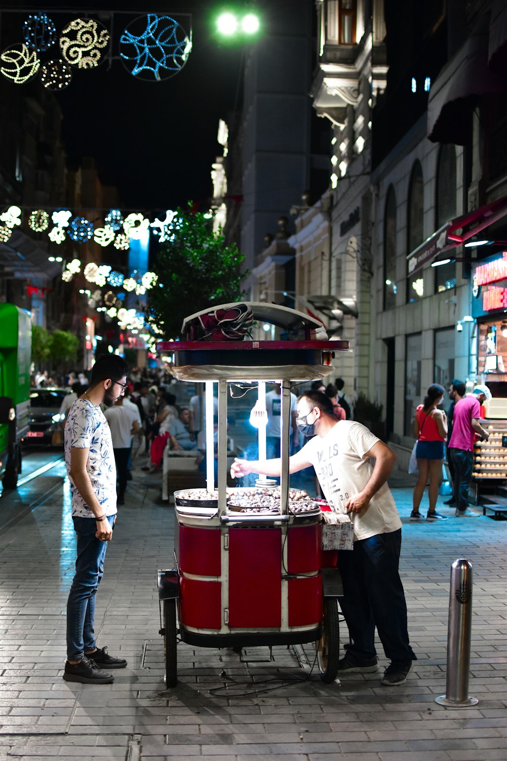 a person selling food on a street