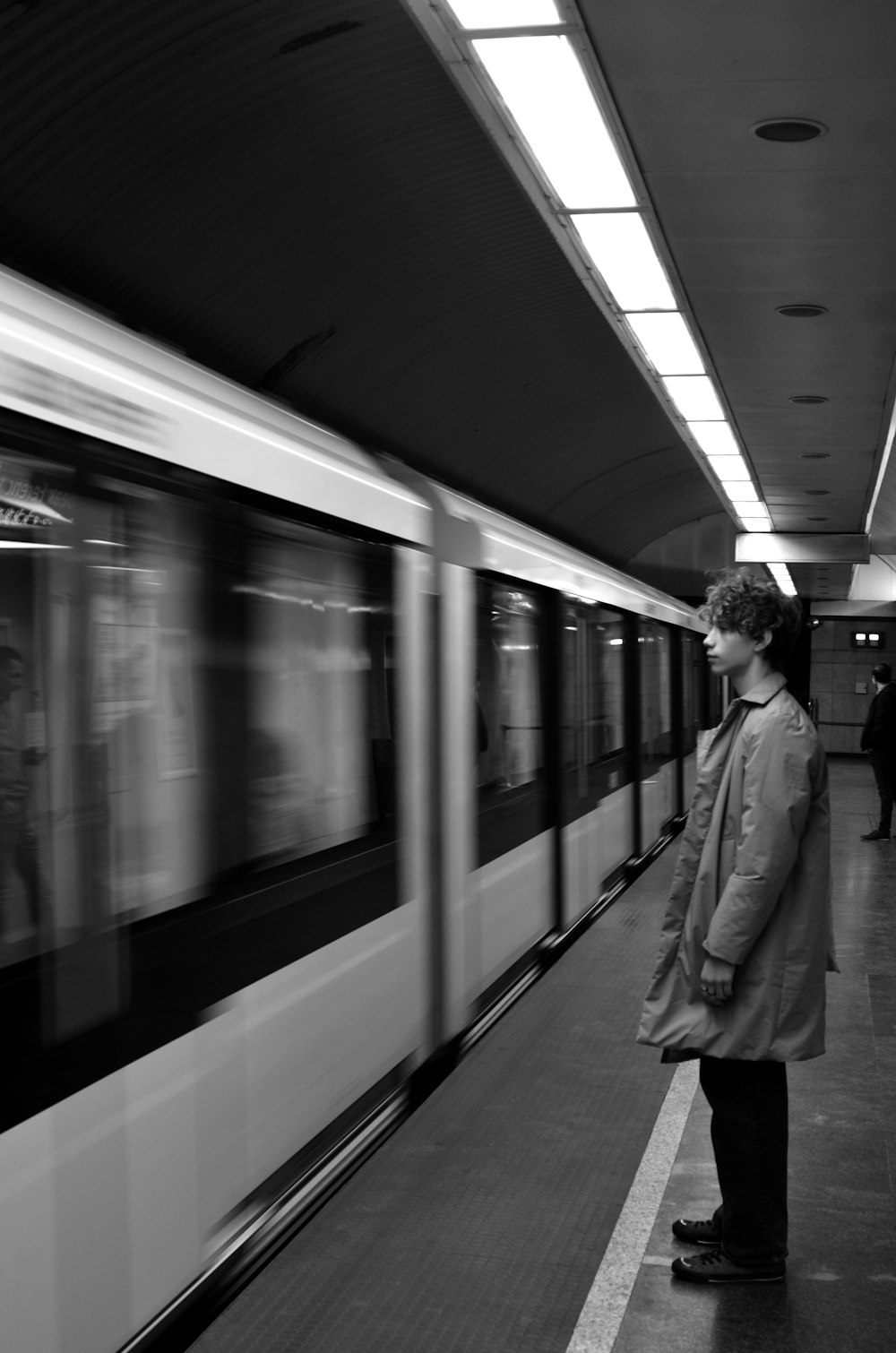 a man waiting for a train