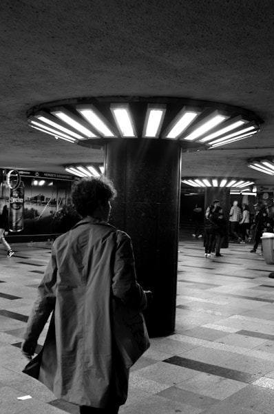 a person walking in a subway station