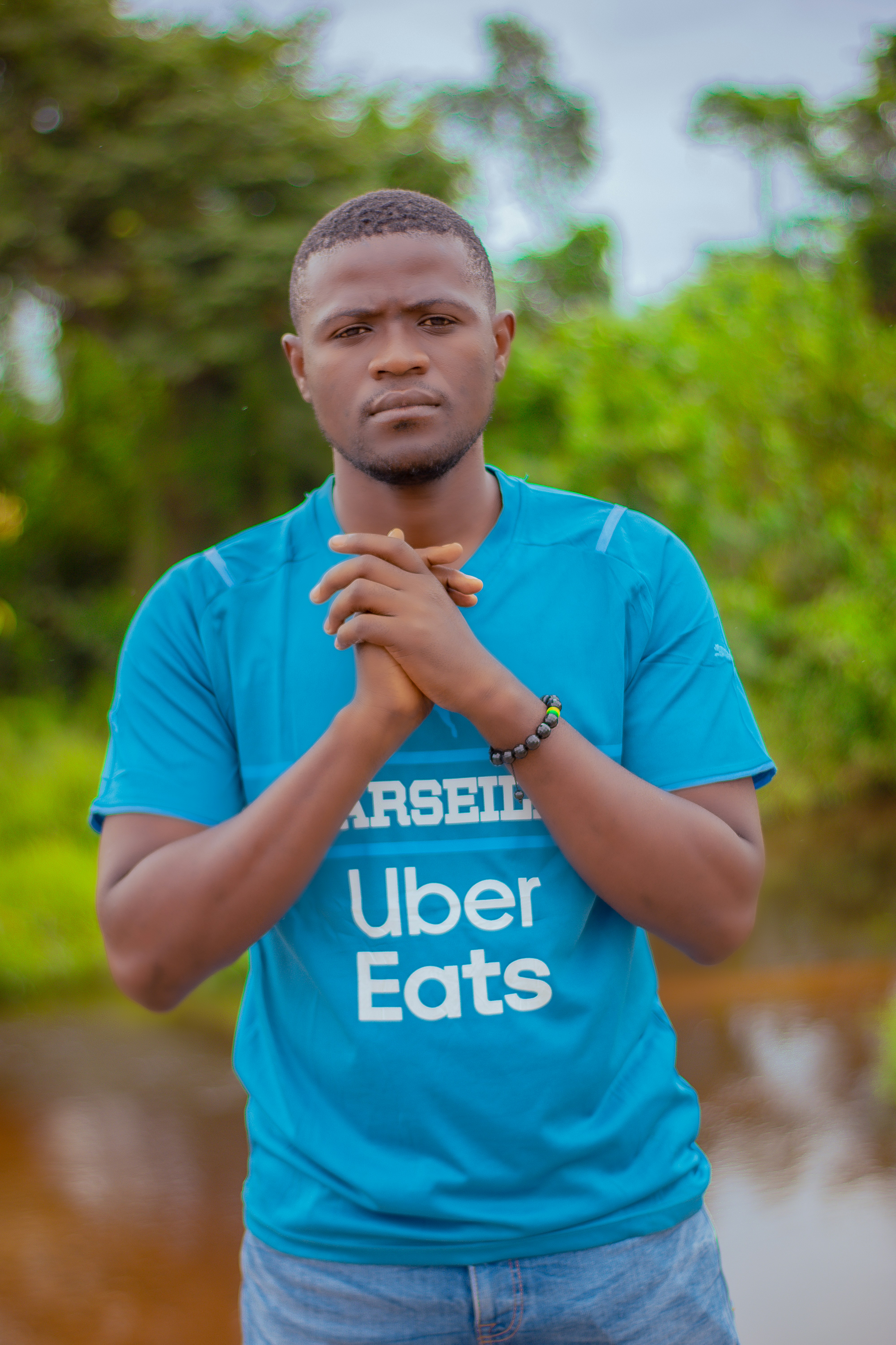 a man with his hands together