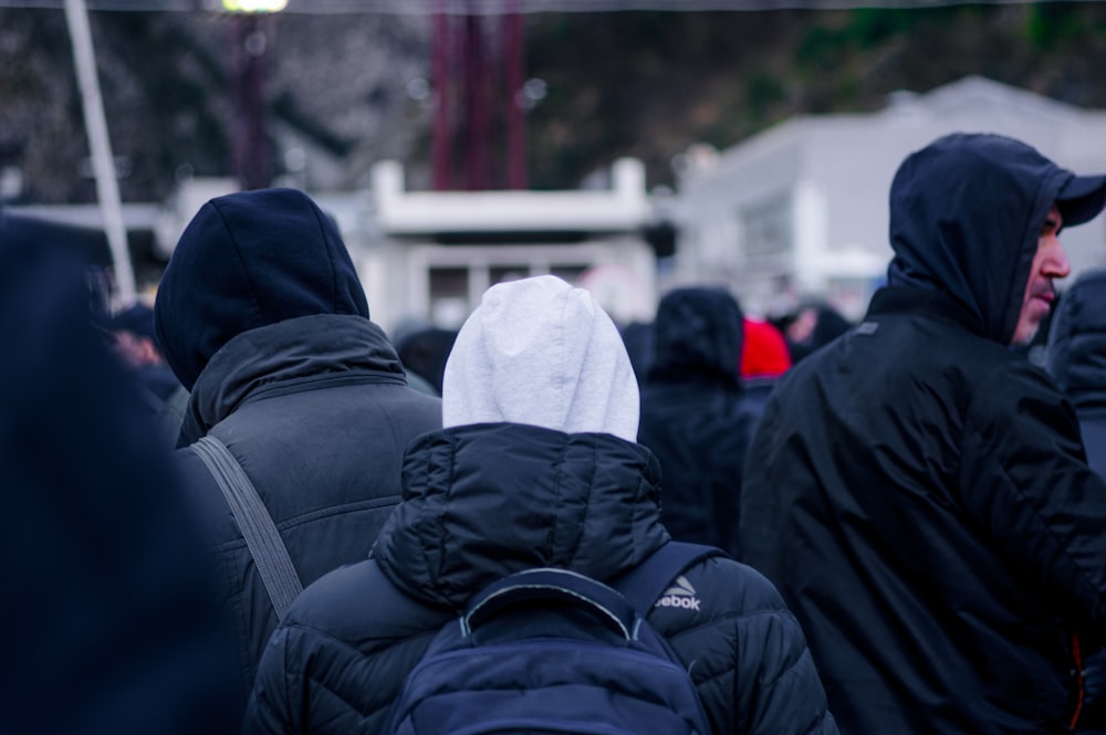 a group of people in winter coats