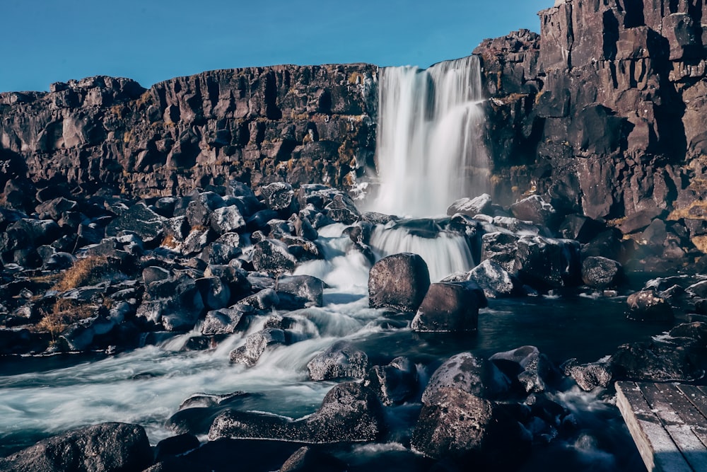 a waterfall over rocks