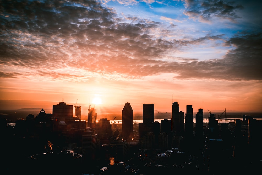 a city skyline at sunset