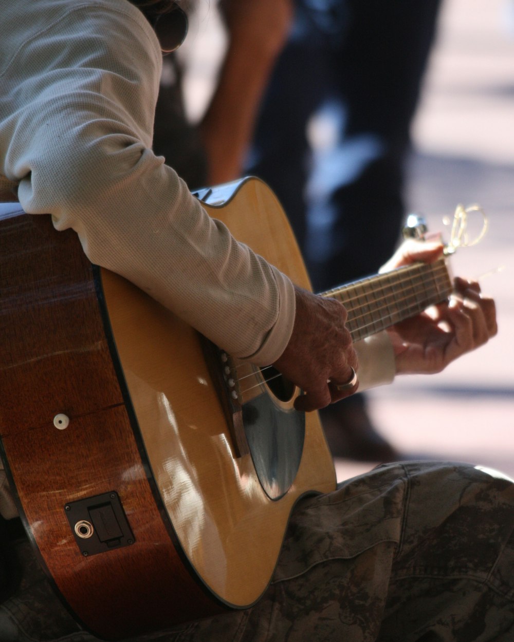 a person playing a guitar