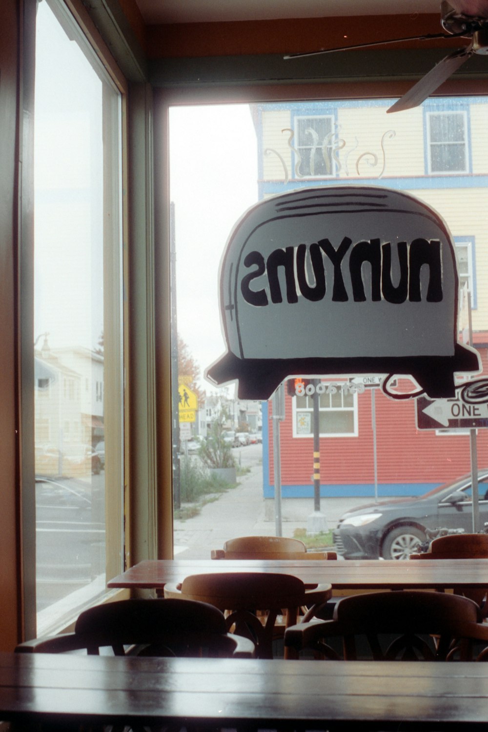 a restaurant sign on a window