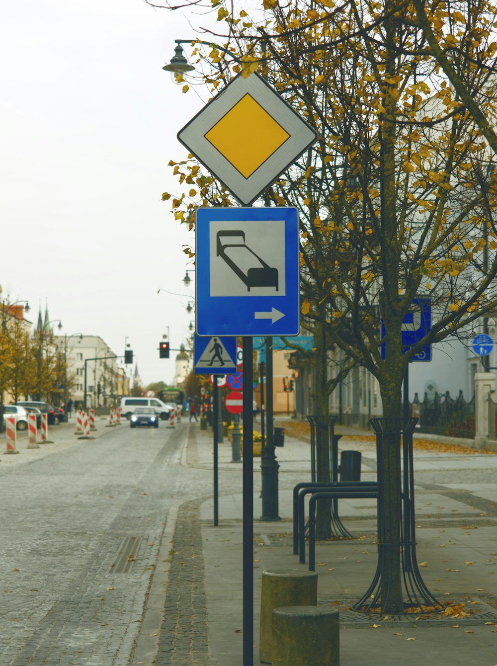 a street sign is posted on a pole