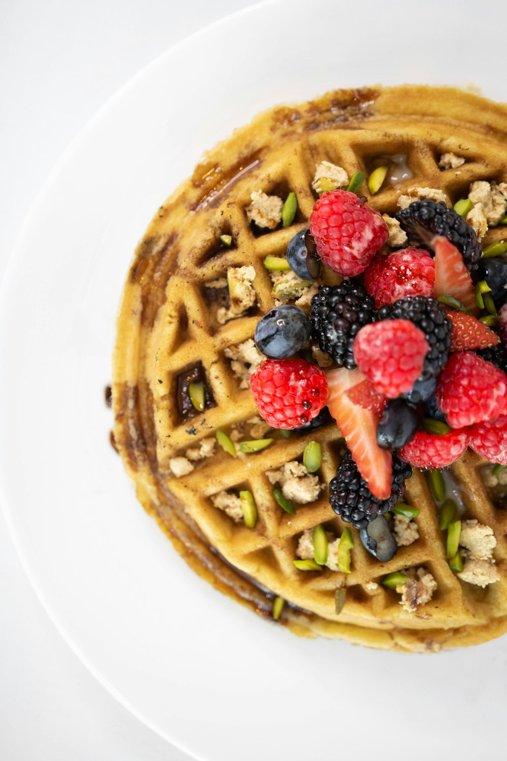 a waffle with fruit on top