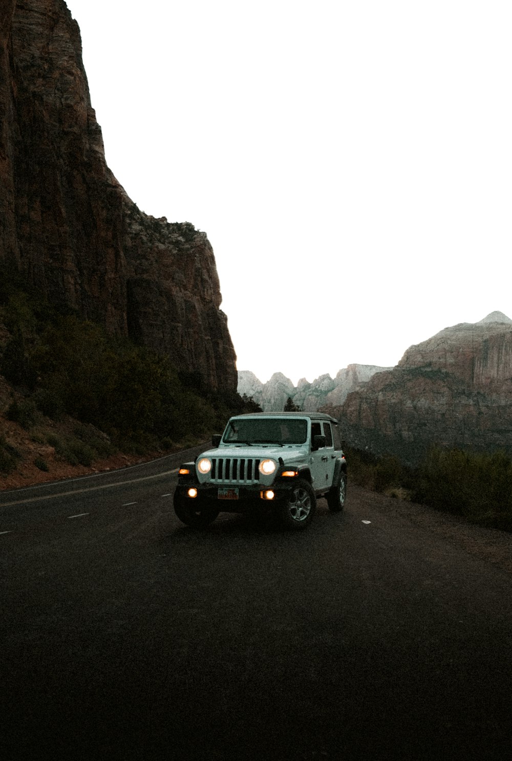 a truck driving down a road