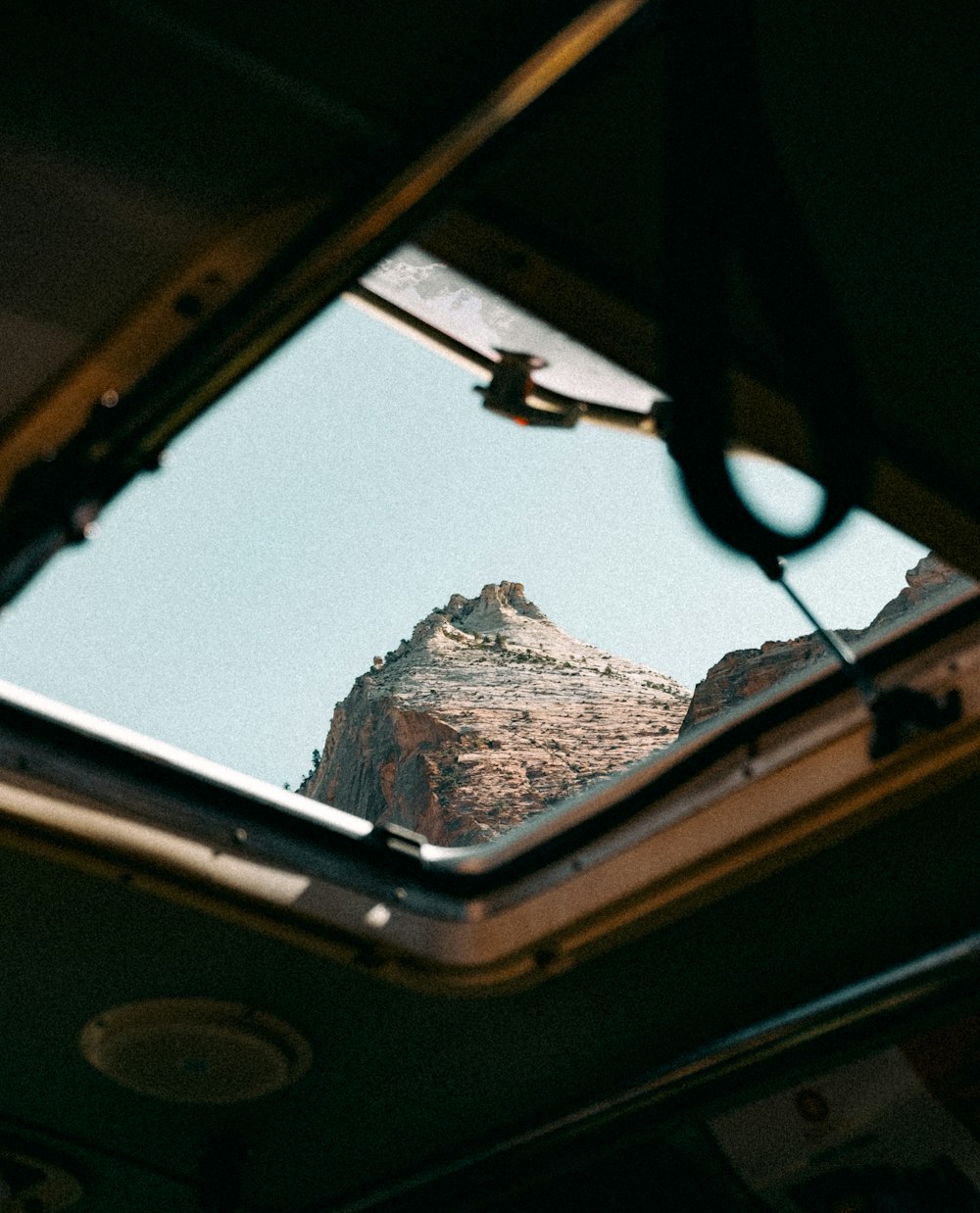 a view of a mountain from a window