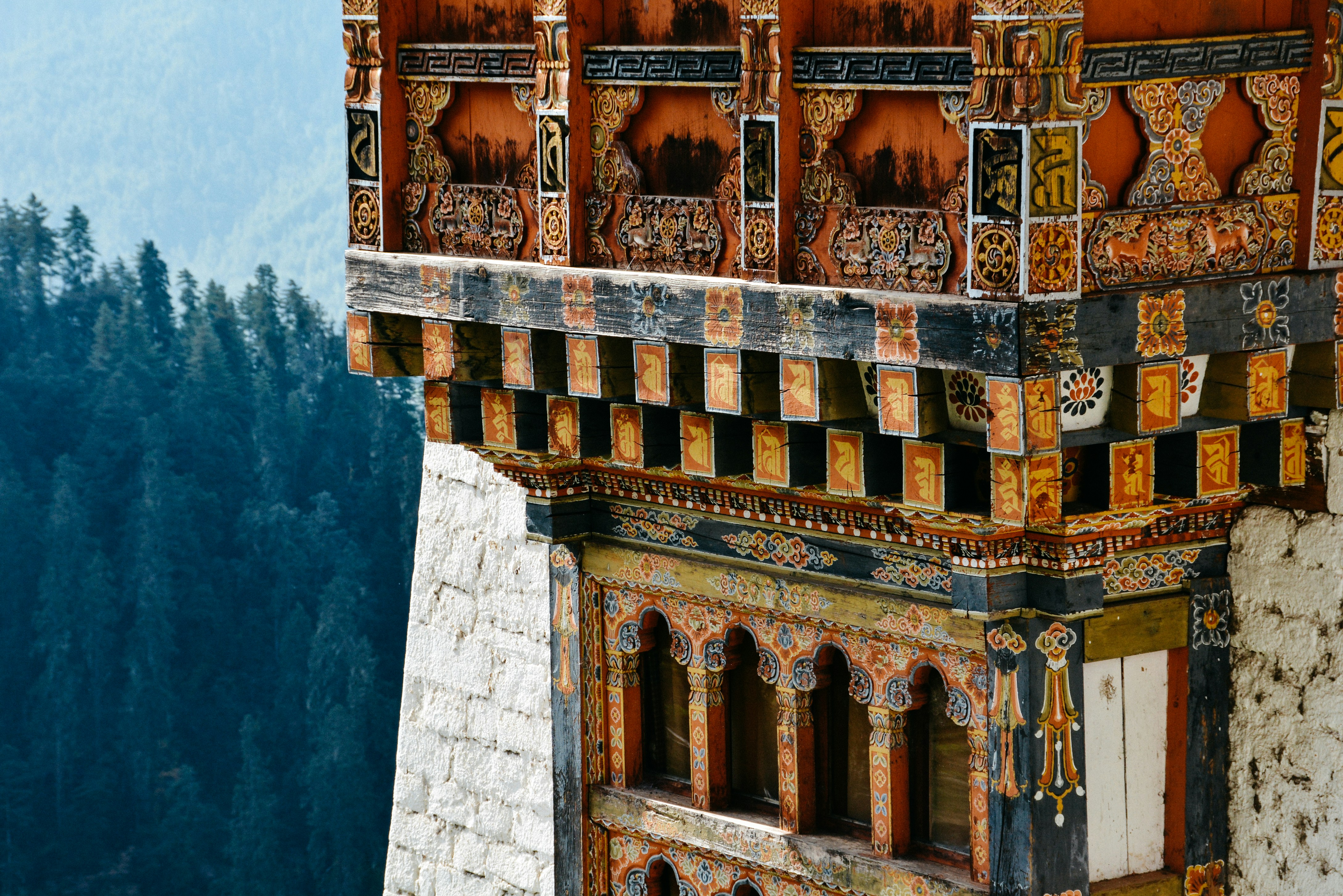 a building with many carvings on it, 