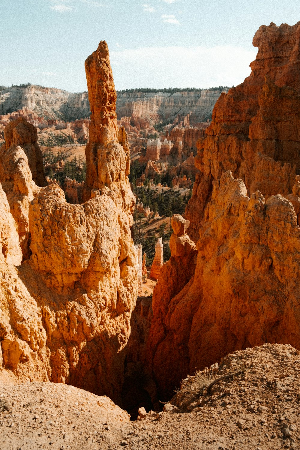 a canyon with a few tall rocks