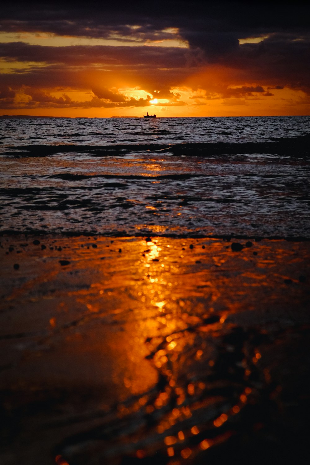 a sunset over a beach