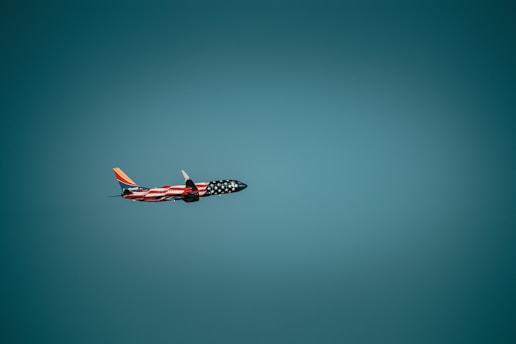 a small airplane flying in the sky