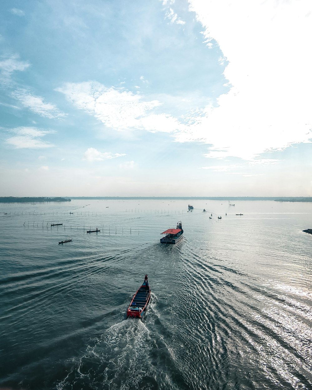 a group of boats on the water