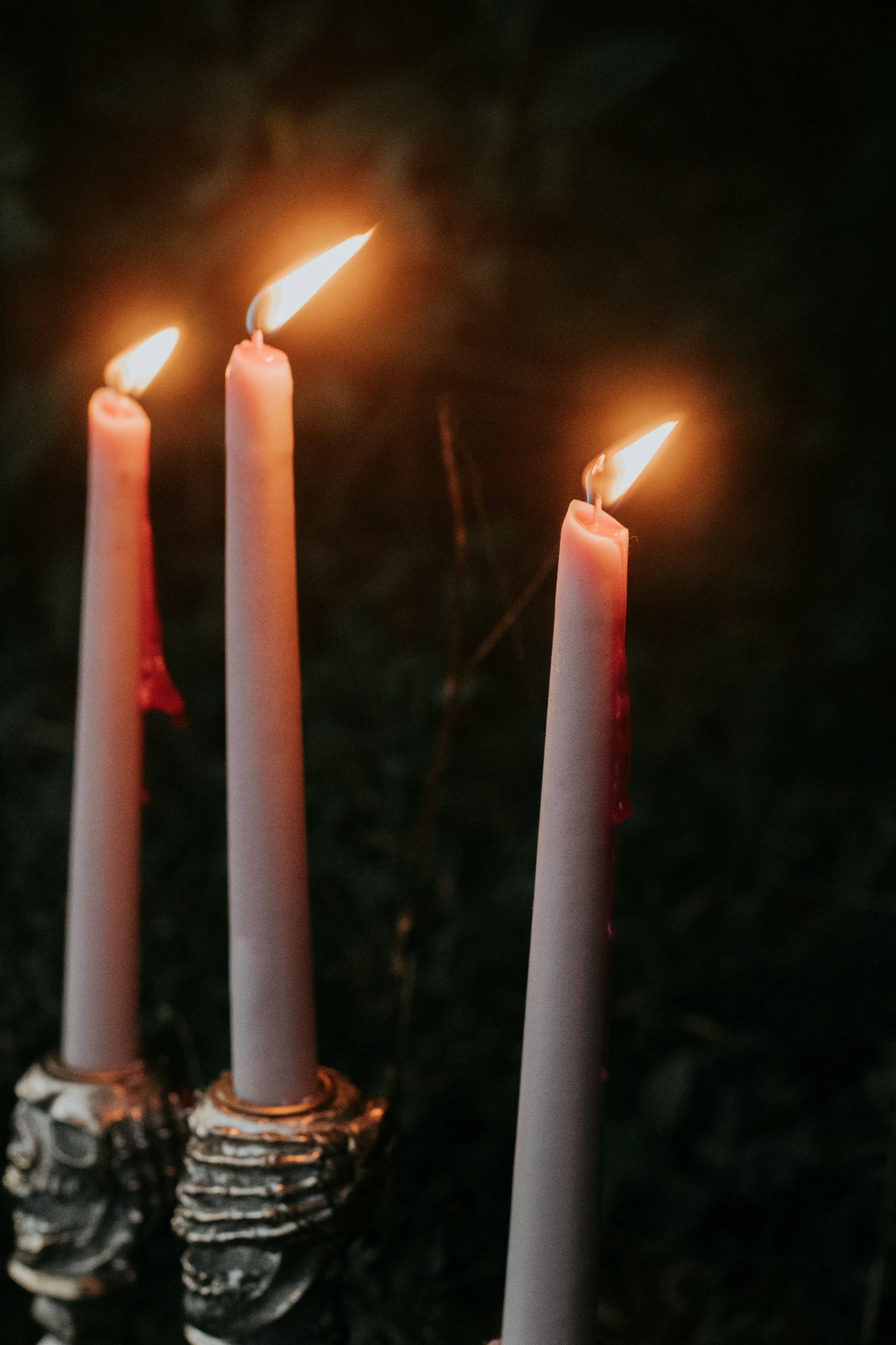 a group of lit candles