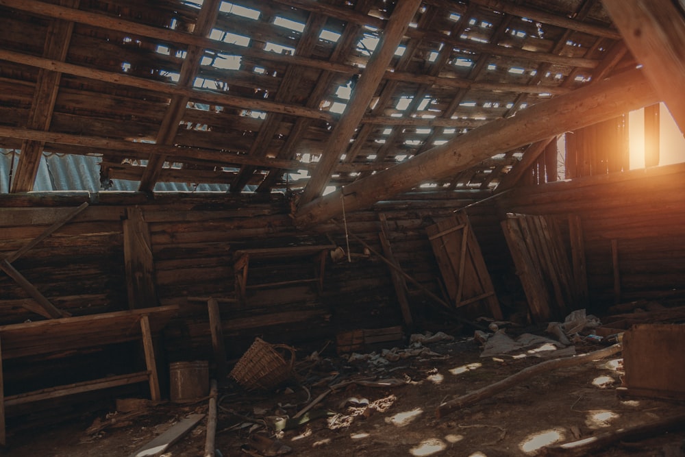 a room with wood beams and wood floors