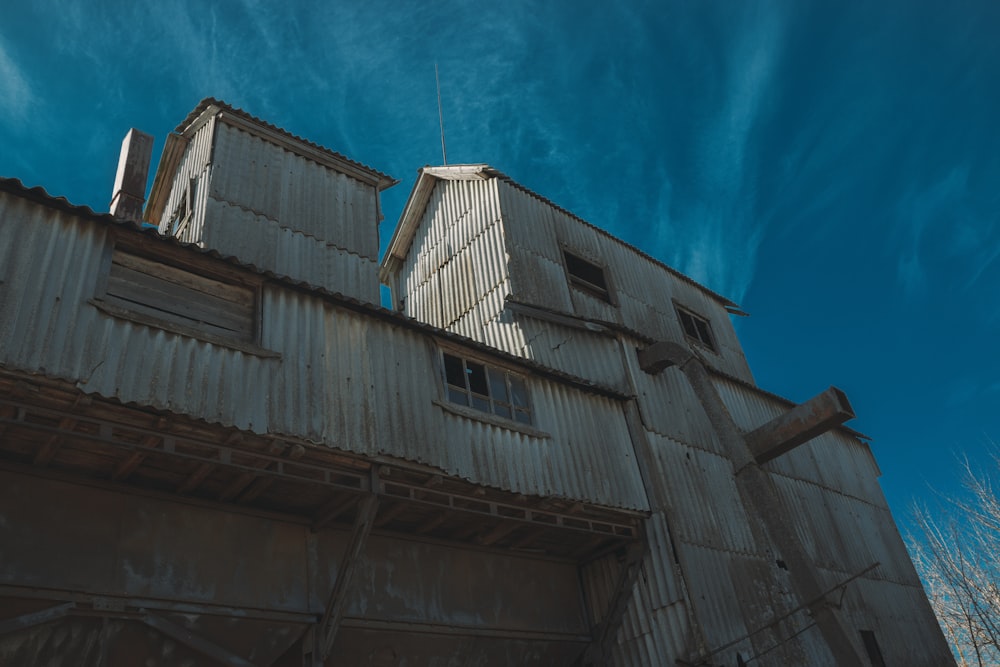 a building with a broken roof