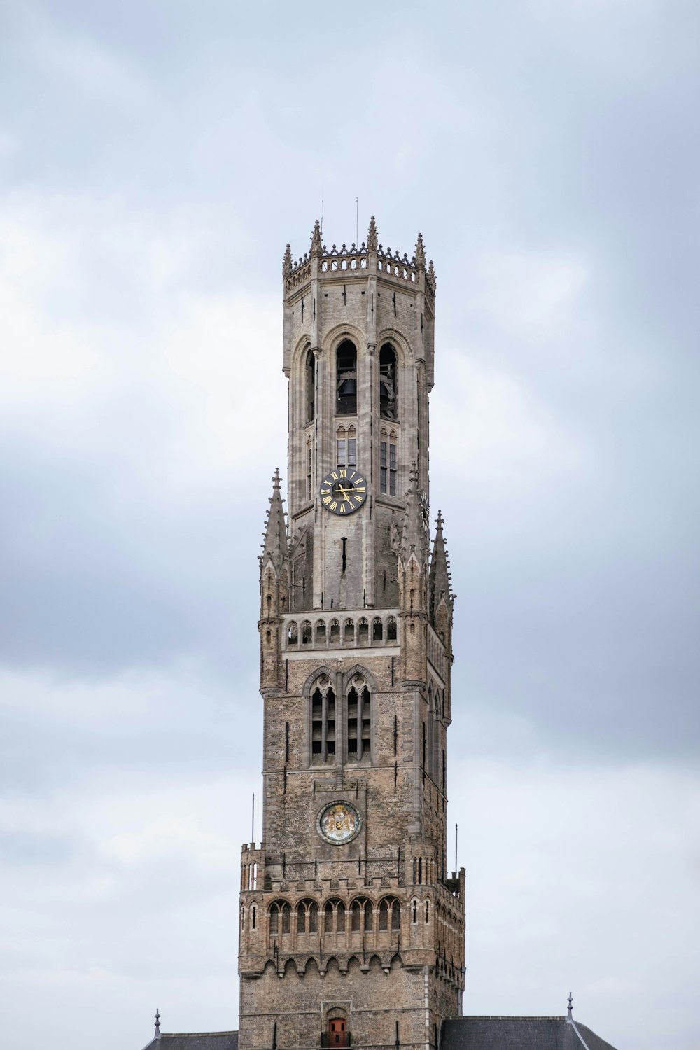 a clock tower with a bell