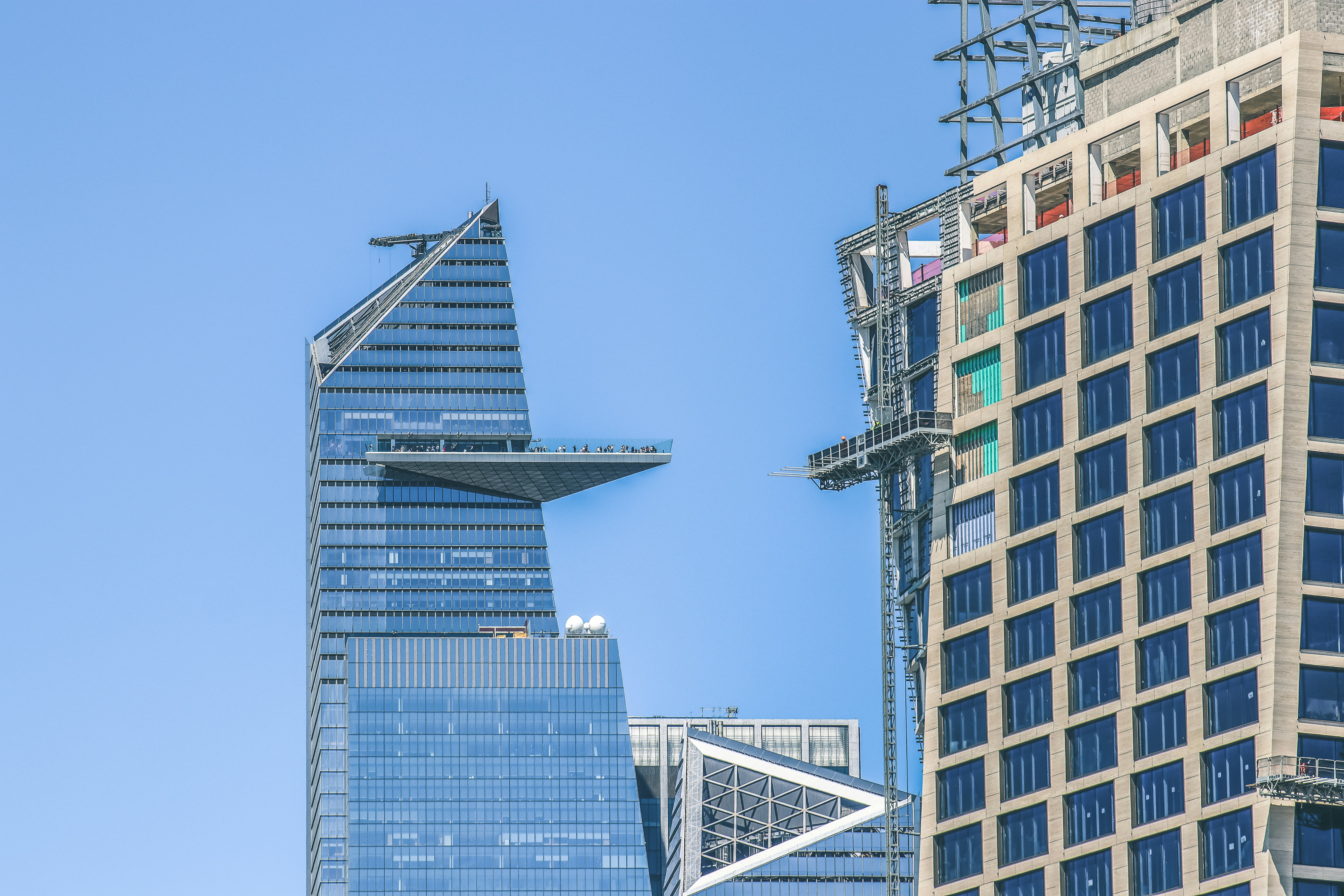a tall building with a flag on top