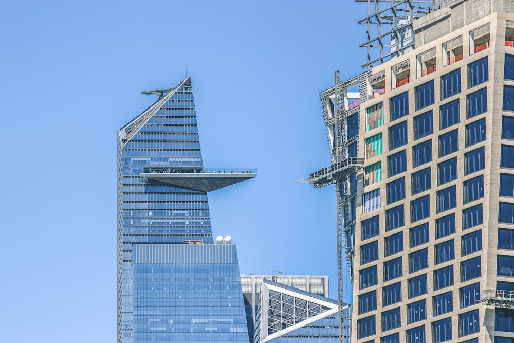 a tall building with a flag on top