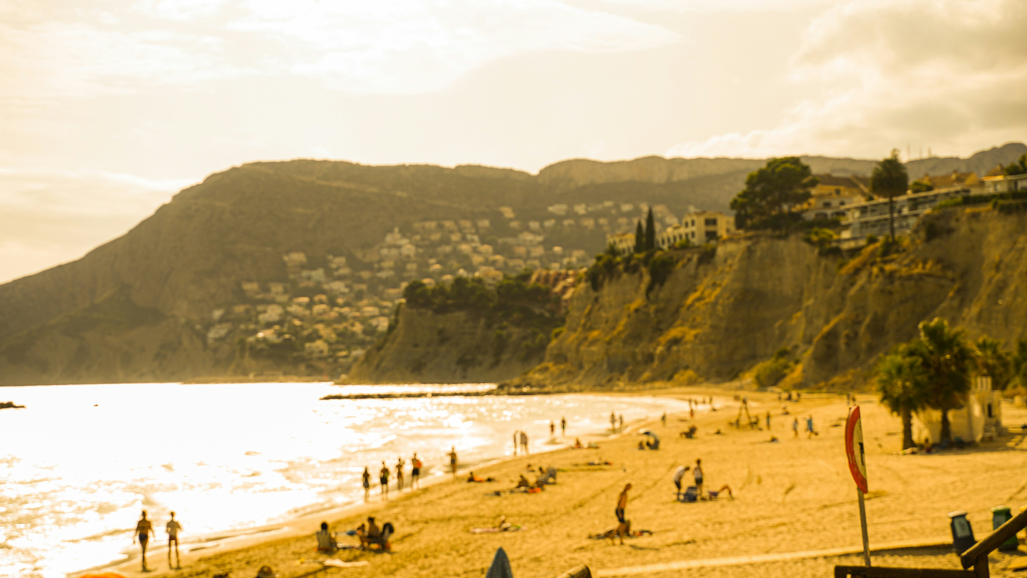 a beach with people on it